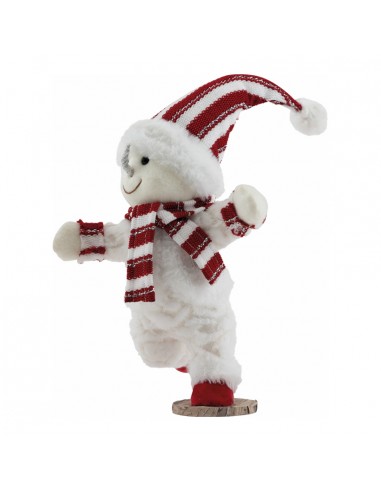 Muñeco de nieve apoyado en un pie para decoración de escaparates en invierno