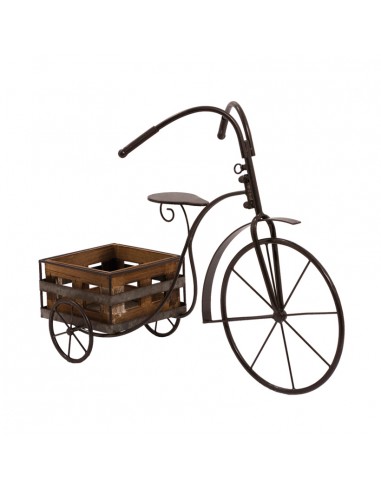 Triciclo retro con cesta para la decoración de espacios en hoteles y escaparates en tiendas
