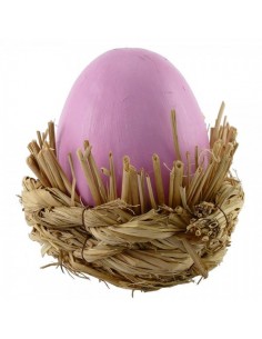 Huevo de pascua con nido para escaparates de pastelerías en pascua de semana santa